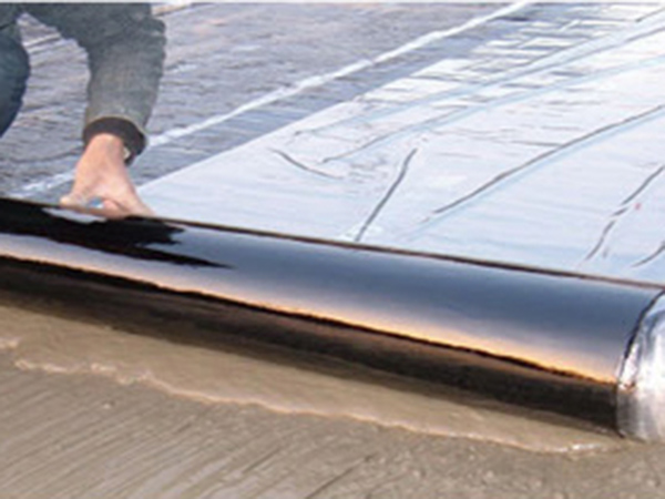 Self adhesive wet laid waterproofing membrane