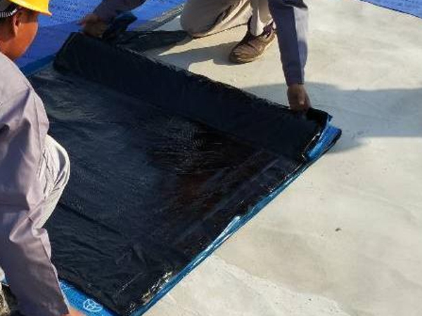 Self adhesive wet laid waterproofing membrane