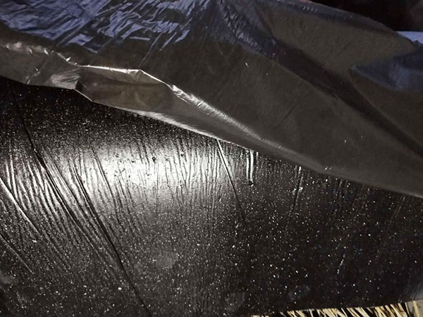 Self adhesive polymer modified asphalt polyester tire waterproof roll