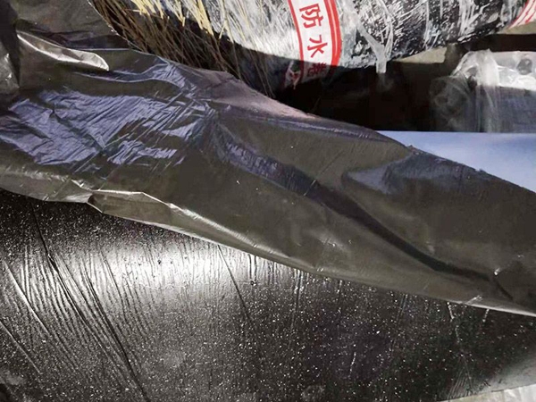 Self adhesive polymer modified asphalt polyester tire waterproof roll